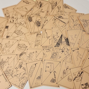 May include: A white ceramic mug with a black handle and the text "But First, Coffee" in a black, handwritten-style font. The mug is on a white surface.