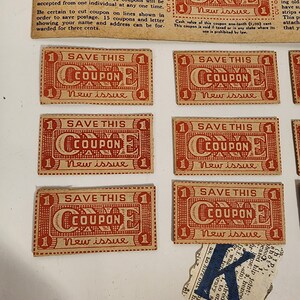 May include: Six vintage coupons printed on brown paper with red ink. Each coupon reads "Save This Coupon New Issue" and has a decorative border.