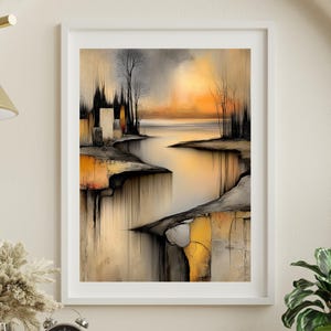 May include: Framed abstract landscape art print. The artwork features a river scene with a sunset in warm tones of yellow, orange, and beige. The print is in a white frame, adding a modern touch to the artwork.
