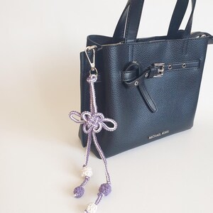 Decorative lavender lucky knot charm for handbag and tote bag