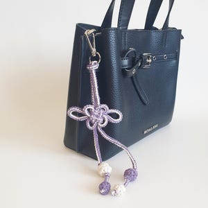 Lavender and ivory purse charm with traditional Korean knot detail