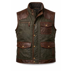 May include: A green and brown vest with a high collar and multiple pockets. The vest has brown leather accents on the shoulders, pockets, and trim. It features a zip closure and button details. The vest is designed for outdoor wear.