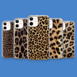 May include: Five phone cases with a leopard print design. The cases are in a row, each with a different pattern variation. The cases have a clear border and a blue background.