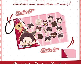 May include: A chocolate shaker keychain featuring a pink chocolate bar design with a red wrapper corner. It includes small character inserts with cat ears and various chocolate shapes. The text reads: Let's stuff every single Valko into the chocolates and sneak them all away! Chocolate Shaker Keychain.