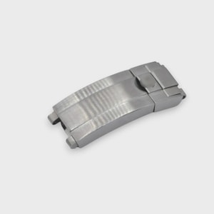May include: A silver watch clasp with a brushed metal finish. The clasp is curved and rectangular, featuring a hinged section and a small, circular button. The design is sleek and modern, suitable for a watch strap.