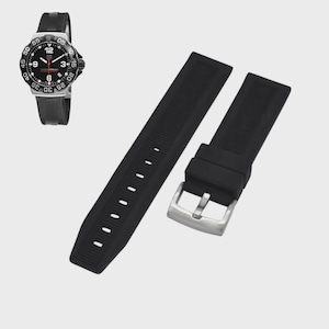 May include: A black watch with a silver bezel and a black rubber strap is displayed next to a new black rubber watch strap. The watch face has white numerals and red accents. The watch strap is 9 inches long.