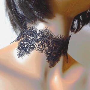 Wide black lace choker on mannequin facing right