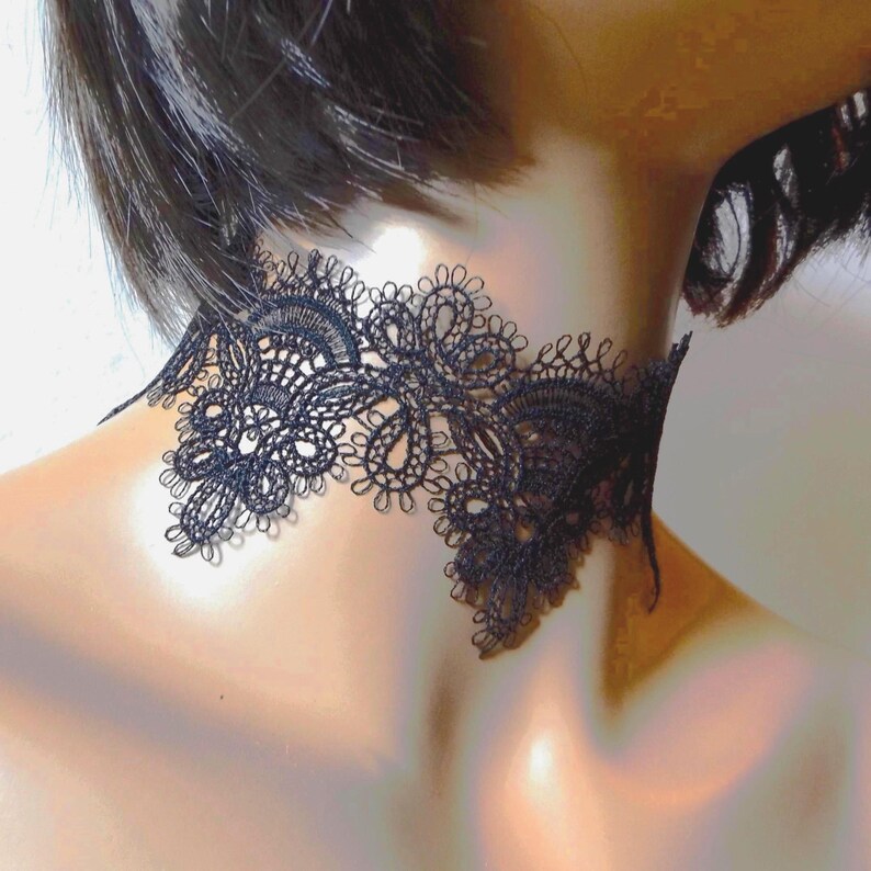 Wide black lace choker on mannequin facing right