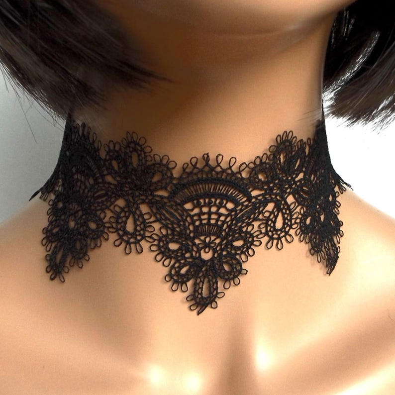 Close-up of black lace choker on mannequin facing forward