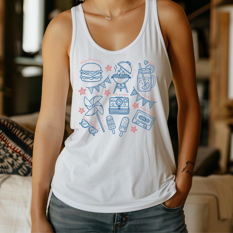 A woman wearing a white tank top with a graphic design of various summer-themed icons and objects, including a hamburger, a windmill, a hot dog, and a drink.