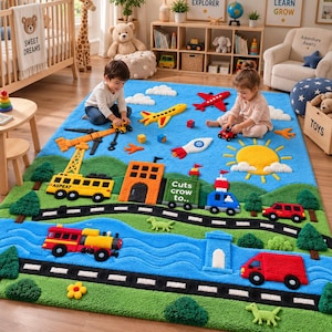 May include: A large, rectangular, blue-based area rug featuring a textured, multi-colored landscape design. It includes a winding black road, a blue river, green hills, trees, a yellow sun, a rocket, airplanes, a train with text, and vehicles.