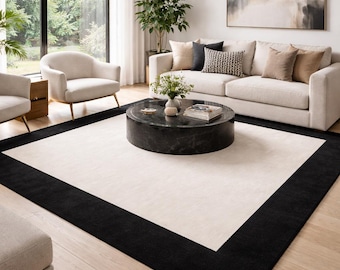 Alfombra tejida a mano con borde negro, alfombra minimalista negra y crema, alfombra rectangular moderna de lana, alfombra contemporánea para sala de estar.