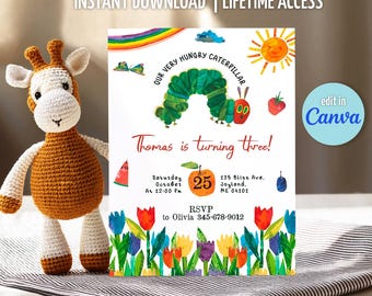 May include: A crochet giraffe toy stands beside a birthday invitation. The invitation features the text "Our Very Hungry Caterpillar" and "Thomas is turning three!" with colourful illustrations of a rainbow, sun, and fruits. The invitation also includes event details.