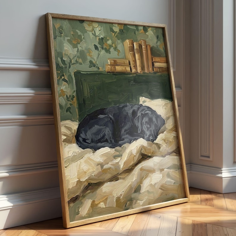 Framed sleeping black Lab print displayed on a nightstand in a cozy cottagecore bedroom with soft linens and warm lighting.