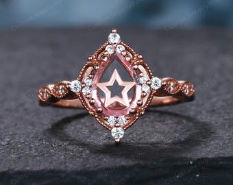 ヴィンテージ ペアカット ピンクサファイア エンゲージリング ユニークな 14K ローズゴールド ポートレートカット スターリング アールデコ モアッサナイト カーブ スタッキング ウェディングバンド