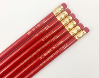 office woes personalized pencil set in rich red. engraved pencils with MATURE swears. not for children or sensitive adults