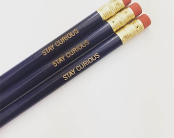 stay curious wonderland pencil set engraved in dark violet. teacher appreciation gift