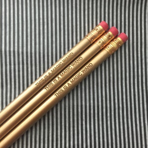 this is a magic wand engraved pencils set in gold. back to school. teacher gifts image 5