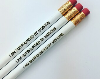 I am surrounded by morons engraved pencil set 3 three white pencils. the misanthrope pencil set. Aquarius approved.