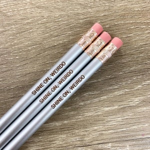 shine on, weirdo engraved pencils in silver. eccentrics are like stars, they brighten up a dark night. galentines bff gift