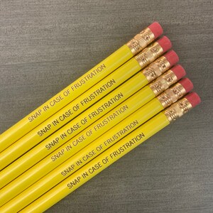 Snap in case of frustration Pencil set of in yellow. image 9