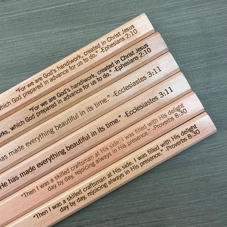 May include: Six wooden pencils with inspirational bible verses engraved on them. The verses are from Ephesians and Proverbs.