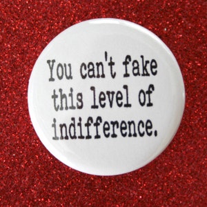 you can't fake this level of indifference. 1.25 inch funny pinback button. image 2