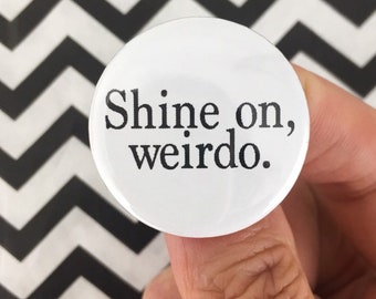 shine on, weirdo. 1.25 inch pinback button. don't hide your weird, wear it proud. introvert button