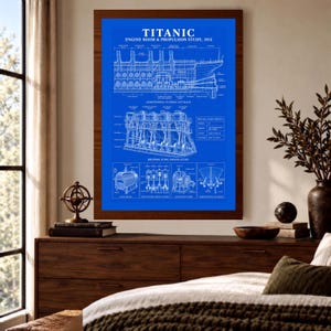 May include: A rectangular wall art print featuring a blue background with white technical line drawings of the Titanic engine room and propulsion system, including the text TITANIC ENGINE ROOM & PROPULSION STUDY, 1912 and various diagrams.