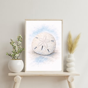 May include: A set of three ceramic mugs with a speckled, matte finish. The mugs are in shades of cream, light gray, and dark gray. Each mug has a simple, minimalist design, perfect for coffee or tea.