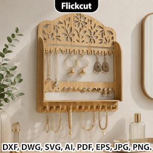 May include: A wooden jewelry organiser with a floral design at the top, displaying necklaces, earrings, and bracelets. The organiser has multiple hooks and a small shelf. The text "Flickcut" is at the top, and "DXF, DWG, SVG, AI, PDF, EPS, JPG, PNG" is at the bottom.