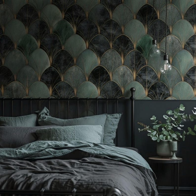 May include: A bedroom scene featuring a bed with gray bedding and pillows. The headboard is black, and the wall behind it is decorated with a dark green and gold fan-shaped wallpaper. Two light bulbs hang from the ceiling.
