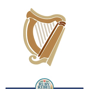 May include: An embroidery design of a harp featuring tan and brown thread colors. The harp has a curved frame, a straight pillar, and vertical strings. Below the harp is a circular logo with the text Ruby Rebel Threads and a wave graphic.