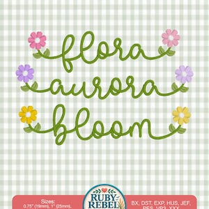 May include: Machine embroidery design featuring the words flora, aurora, and bloom in green cursive script, each flanked by small pink, purple, and yellow flowers. A red banner at the bottom lists sizes 19mm, 25mm, 31mm, 38mm and file formats.