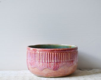 Sam, a small bowl, to keep your trinkets/rings/candy/nuts/snacks in