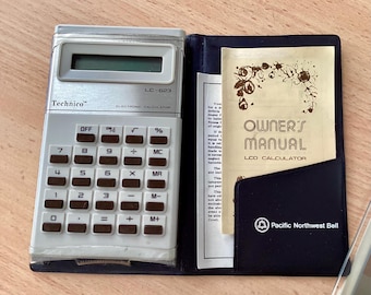 Calculator Technico LC-623 Pocket Calculator Advertising Pacific Northwest Bell