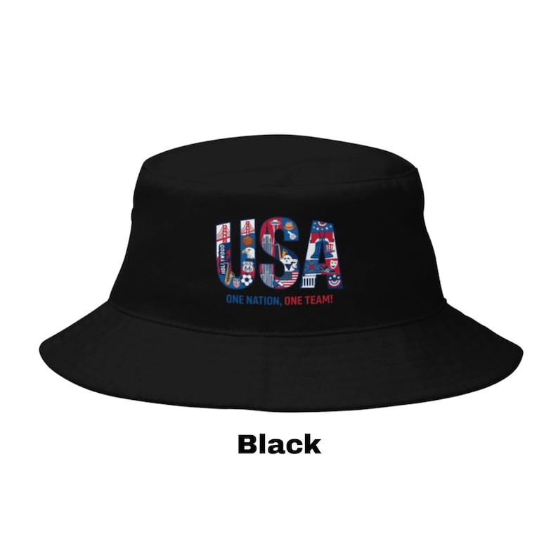 May include: Black bucket hat with a colourful "USA" design. The hat has the text "ONE NATION, ONE TEAM!" below the USA graphic. A fashionable accessory for showing national pride.