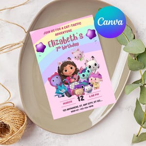May include: A pink birthday invitation with the text "Elizabeth's 7th birthday" and the phrase "Join us for a cat-tastic adventure." The invitation features cartoon cat characters and a rainbow design. The date is March 12th at 6:00 PM.