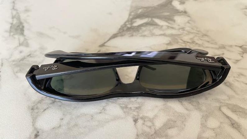Gafas de sol Ray-Ban RB4194 601/9A 53-17 140 3P con lentes polarizadas verdes y montura negra. Usadas. imagen 17