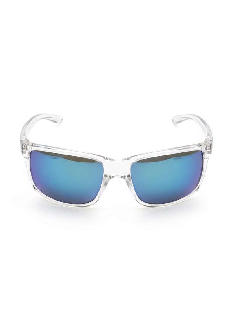 May include: Clear rectangular sunglasses with blue mirrored lenses. The frames are transparent, and the lenses reflect a vibrant blue hue. A modern eyewear accessory.
