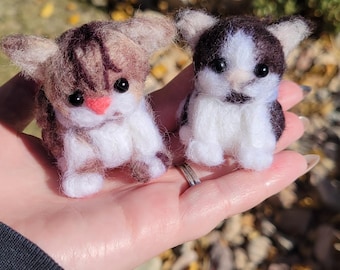 Aangepast miniatuurbeeldje kattennaald