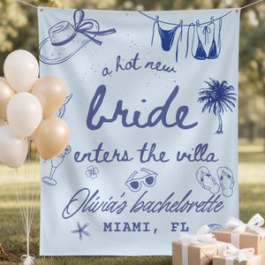 May include: A light blue banner with the text "a hot new bride enters the villa" and "Olivia's bachelorette Miami, FL" in navy blue. The banner has illustrations of a sun hat, bikini, palm tree, and sunglasses. A bundle of balloons and wrapped gifts are in front.