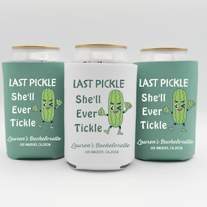 May include: Three can coolers with the text "LAST PICKLE She'll Ever Tickle" and a cartoon pickle. The coolers are teal and white, with "Lauren's Bachelorette LOS ANGELES, CA.2026" printed on them.