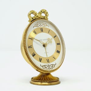 Vintage Brass Oval Alarm Clock with Gold Bow by Swiza Sheffield