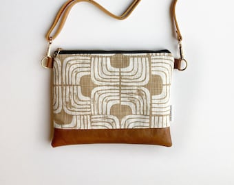 Small crossbody bag in natural arches