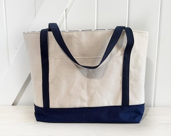 Cream Canvas Tote bag with navy bottom and navy cotton straps and polka dot interior