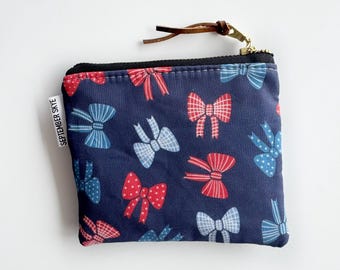 Patriotic red white and blue bows in square mini pouch