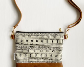 Small crossbody bag in black and cream embroidery