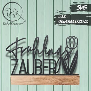 May include: Black metal sign with the words "Frühlingszauber" and a tulip design, mounted on a wooden base. The sign is set against a light green wooden background. The image also includes the text "SVG" and "inkl. GEWERBELIZENZ".