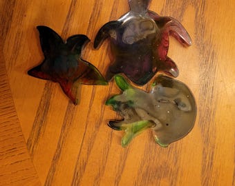 Colorful small dolphin, starfish, octopus,  turtle magnets